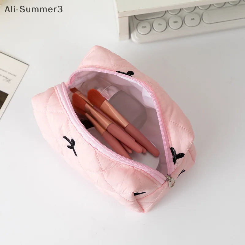 Trousse maquillage matelassée à nœud – Organiseur esthétique & voyage