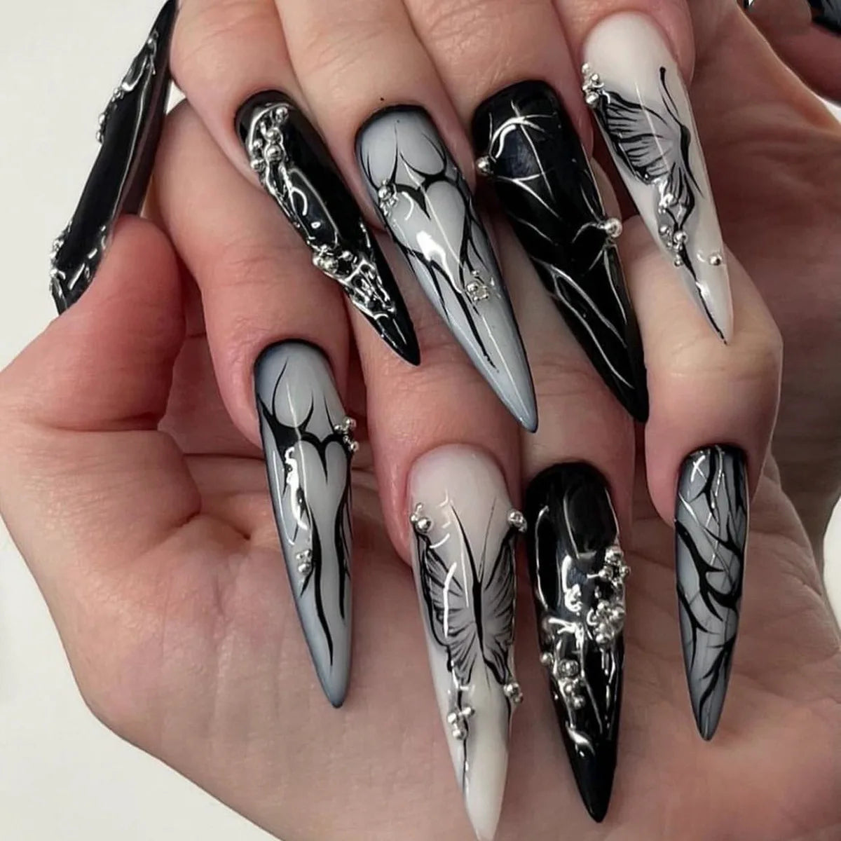 Faux ongles press-on noirs design artistique – Motifs graphiques, effet 3D, style audacieux