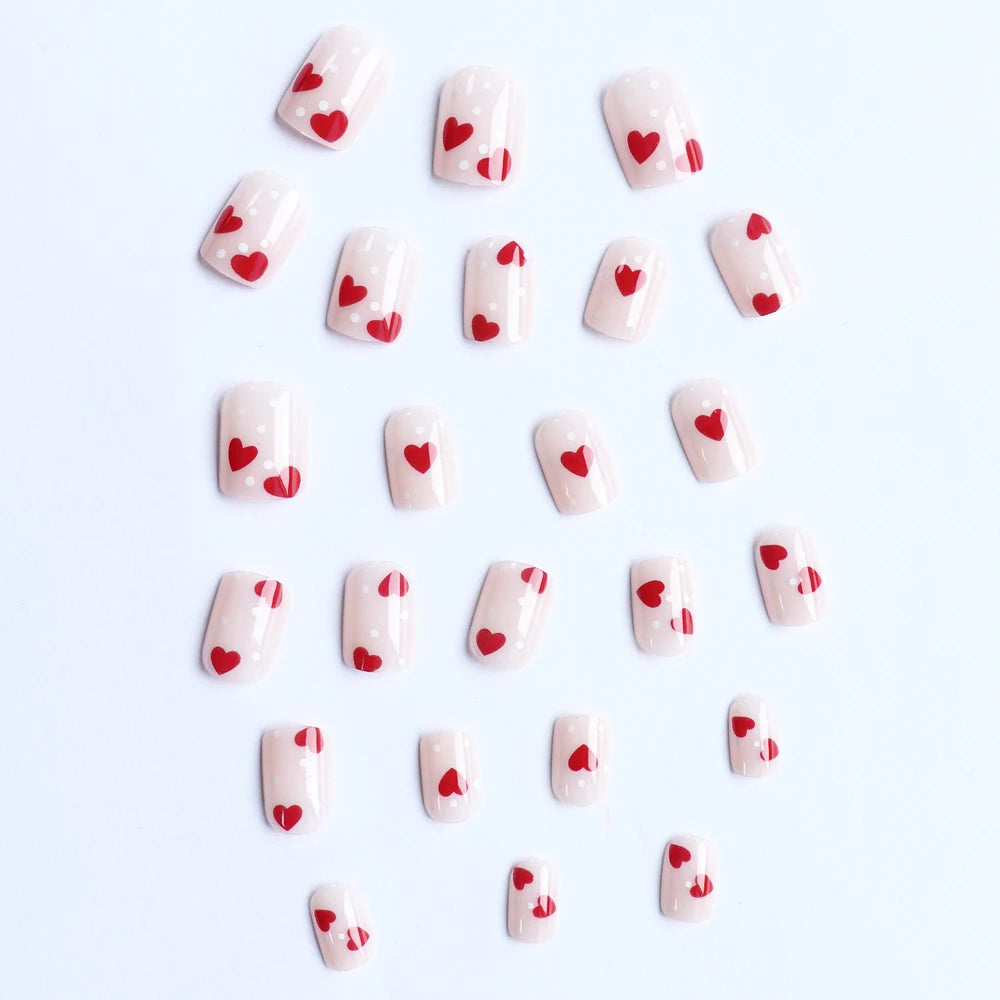 Faux ongles press-on amande décor cœur – Blanc & coloris variés – 24 pièces