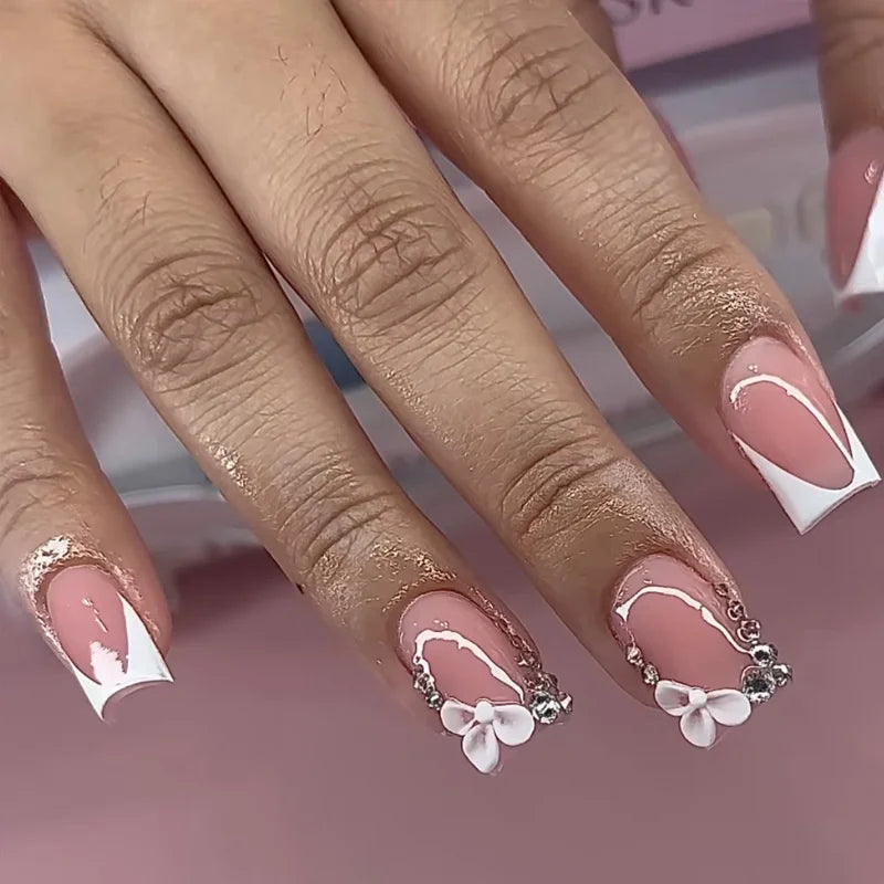 Faux ongles press-on rose effet French – Motif fleurs, plusieurs coloris