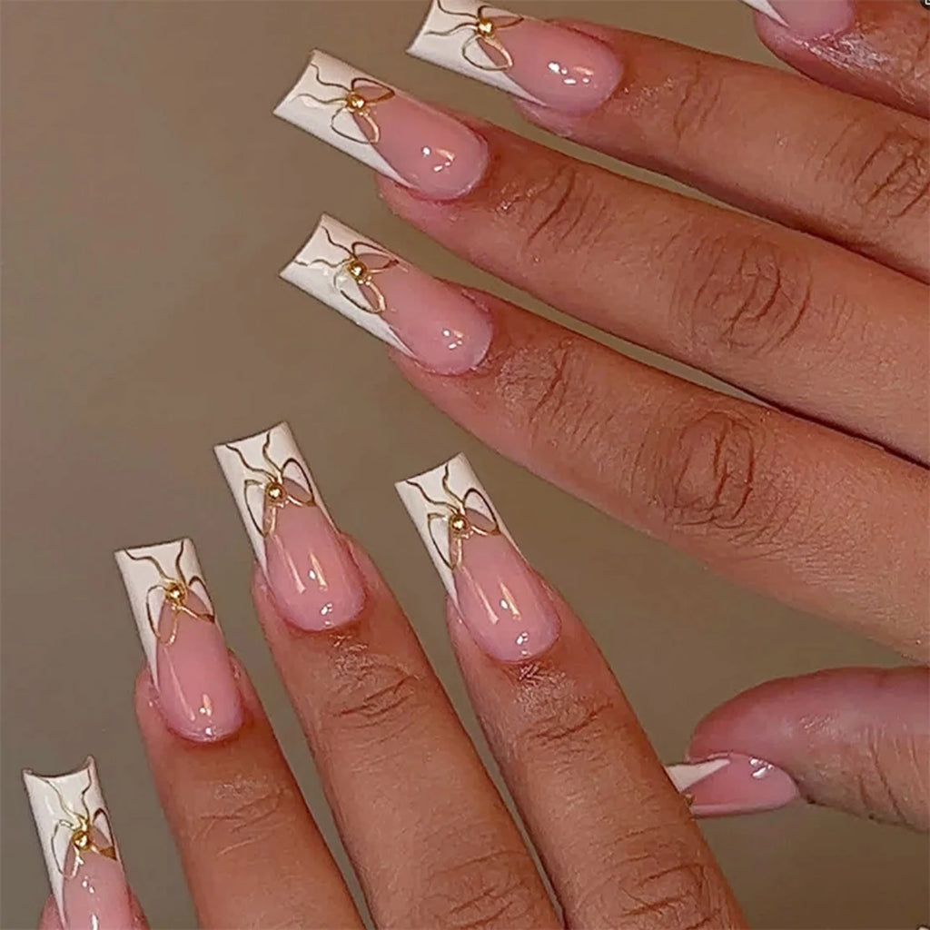 Faux ongles press-on rose effet French – Motif fleurs, plusieurs coloris
